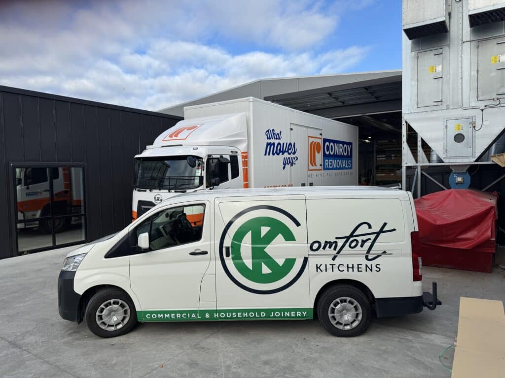 Loading products into Conroy Removals truck at Comfort Kitchens depot.