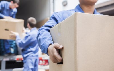 Movers unloading a moving van